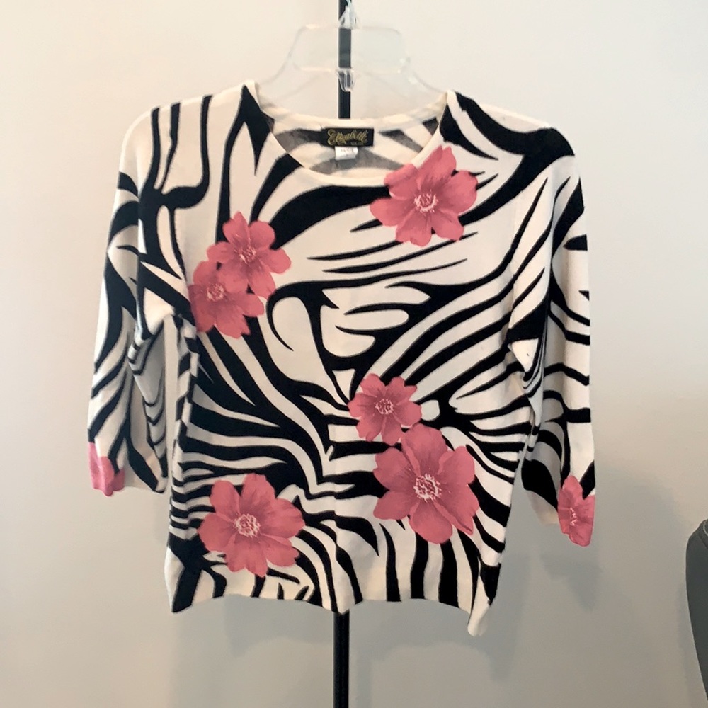 Beautiful soft light sweater with pink glitter